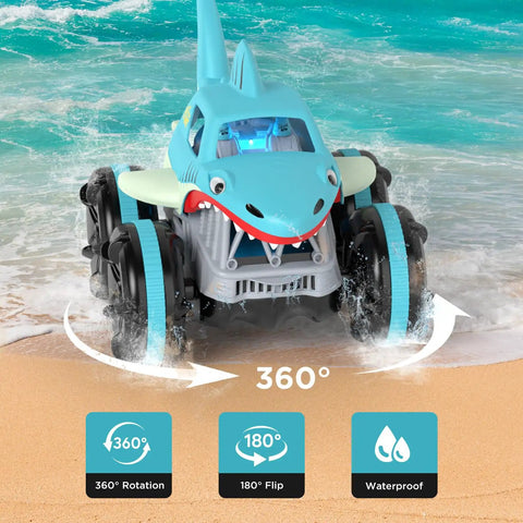 Amphibious RC Shark Car 1:14 Scale navigating sand and water with 360-degree rotation and waterproof features.