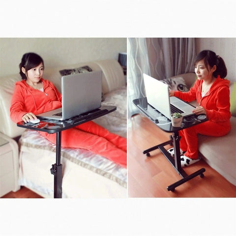 Smooth Operator Height Adjusting Overbed Table Rolling Desktop Stand Up Computer Workstation in use by a person with laptop.