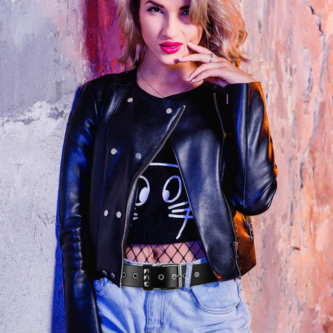 Woman wearing Rock Rivet Belt With Pyramid Studs, edgy punk studded belt, black metal grommet belt for everyday street style.