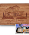 Personalized wooden cutting board with laser-engraved house illustration and Jessica & Thomas at 4454 Washington St.