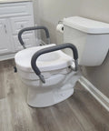 EZ Lock Toilet Seat Riser with Safety Frame, 5 inch lift, padded handles, secure locking on round toilet in a modern bathroom