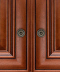 Flower Shape Metal Pull Knobs Set Of Four In Bronze Tone For Cabinets And Drawers With Screws Included Each Knob Measures About 1 Inch By 1.4 Inch No Fuss Rustic Hardware Upgrade For Kitchen Bath Or Office installed on wooden cabinet doors.