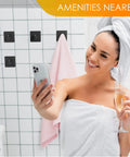 Bathroom with Matte Black Self Adhesive Towel Hooks, Heavy Duty SUS304 Stainless Steel Wall Mounted, towel hanging, woman smiling.