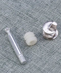 Cam Lock Fittings Set For Furniture Assembly 24 Pieces With Anti Rust Iron And Plastic Material on fabric surface