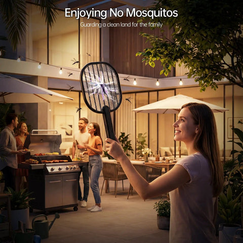 Woman using Ultimate 3500V Bug Zapper Handheld Electric Fly Swatter With 5 Layer Protection Grid in backyard party scene