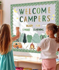 Two children looking at Camping Bulletin Board Kit With Adventure Mountain Back to School Decor Includes Tent and Campfire Cutouts.