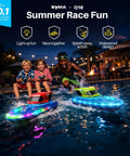 Children playing with Two Pack RC Boats For Kids Ready To Race With 7 Mode LED Lights Water Spray Dual Batteries in a pool at night.