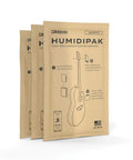 Guitar Humidifier Pack With Two Way Humidification System For Automatic Humidity Control In Your Case Maintains A Forty Five To Fifty Percent Relative Humidity Range And Includes Three Replacement Packets shown in packaging.