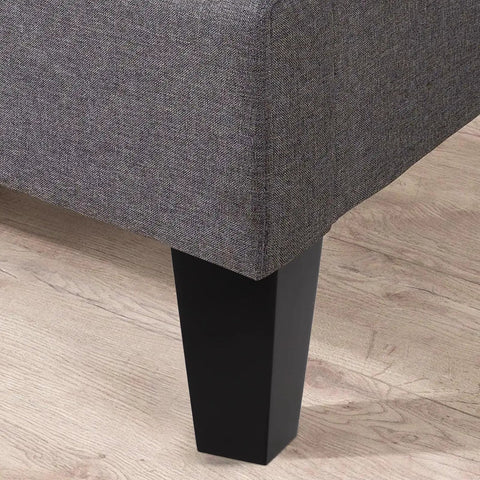 4 Pack Black Wood and Iron Furniture Legs Replacement for Cabinets and Benches shown attached to grey upholstered furniture