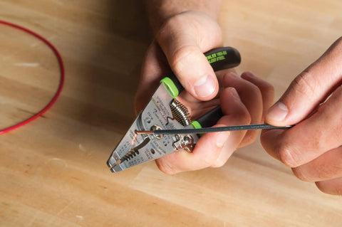 Hand using Stainless Steel Wire Stripper For 10-18 AWG Solid And 12-20 AWG Stranded, Heavy Duty Stripper Cutter