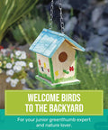 Build A Birdhouse Bungalow DIY Kit For Kids with seven wooden pieces painted in colorful designs and hanging chain outdoors.
