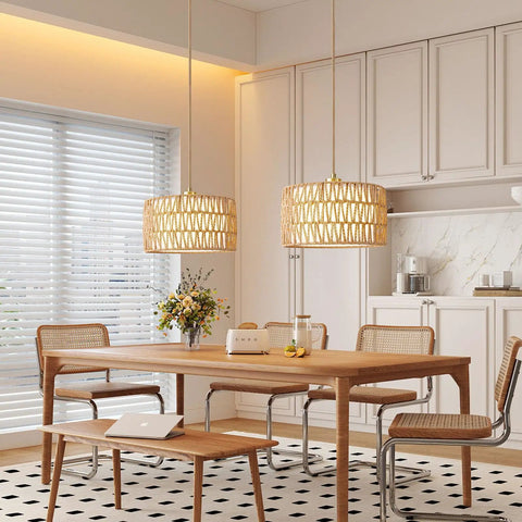 Level Up Your Chill Zone With This Hand Woven Rattan Plug In Pendant Light over a wooden dining table featuring a flower vase.