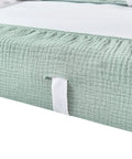 Ultra Soft Muslin Changing Pad Cover For Baby Diaper Changes fits 32x16 to 34x16 standard pads, close-up of elastic edge detail.