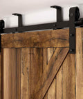 Close-up of 8Ft Ceiling Mount Sliding Barn Door Hardware Kit For 48 Inch Wide Single Wood Door with black finish track and hangers.