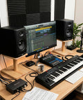 Solid Wood Desktop Speaker Stands With Natural Style And 360 Degree Rotatable Top Plate For Medium To Large Desk Speakers And Studio Monitors In Walnut Brown Finish on a studio desk with equipment