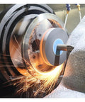 Heavy Duty Rotary Table Bearing Built Like A Tank For Rock Solid Precision Rotation Slewing Ring Turntable Setup For Professional Machine Shops And Factory Gear 600mm in action with flying sparks during machining.