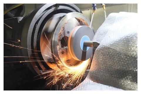 Heavy Duty Rotary Table Bearing Built Like A Tank For Rock Solid Precision Rotation Slewing Ring Turntable Setup For Professional Machine Shops And Factory Gear 600mm in action with flying sparks during machining.