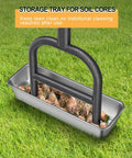 Manual Lawn Core Aerator With Stainless Steel Core Plugs And Storage Tray placed on grass with soil cores visible