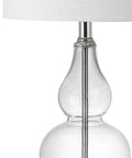 Close-up of Clear Glass Table Lamp 20.5 Inches With White Linen Shade Sleek Modern Gourd Design, featuring chrome accents.