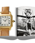 Watch Nerds Guide A Rich Coffee Table Book On Timepieces with open pages featuring a gold wristwatch and vintage aviation photo.