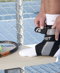 A60 Ankle Support Brace For Right Foot White Medium With Side Stabilizers Molded At Sixty Degree For Mild Support on foot with tennis gear