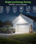 200W LED Parking Lot Light With 30000LM Dusk To Dawn Photocell illuminating garage with pickup truck in driveway at night