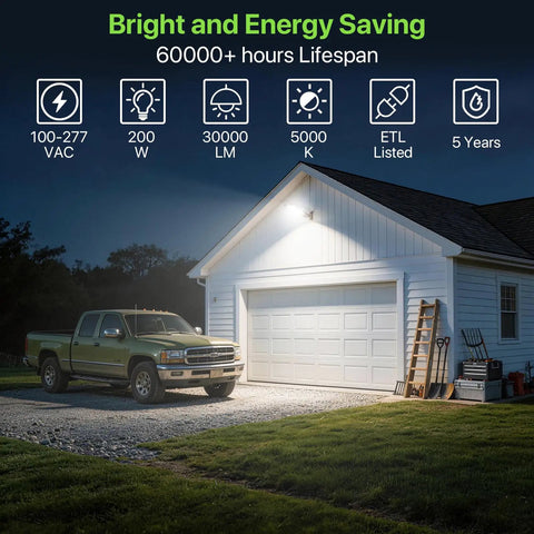 200W LED Parking Lot Light With 30000LM Dusk To Dawn Photocell illuminating garage with pickup truck in driveway at night