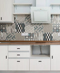 Modern kitchen with patterned backsplash, white cabinets, and 10 Pack Black Square Bar Cabinet Knobs 2 Inch Matte Black Single Hole Kitchen Cabinet Pulls.