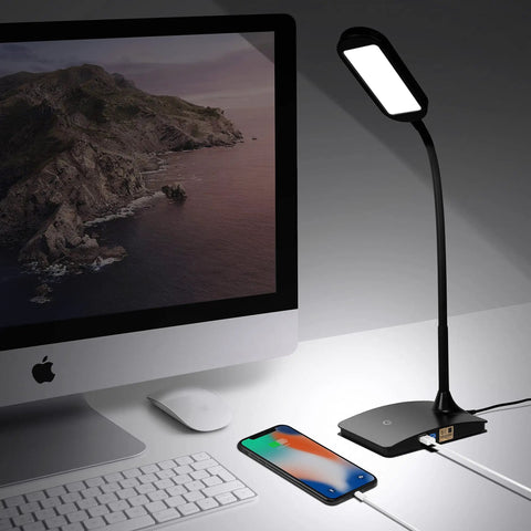 Ivy LED Desk Lamp With USB Port And 3 Way Touch Switch, Ultra Efficient Black Reading Light beside a desktop computer.