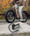 Weatherproof 5 Pin LCD Display for Electric Bikes, Waterproof Bike Dashboard for 22.2mm Handlebars on rock, cyclist in background