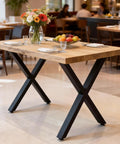 Rock Solid Heavy Duty 28 Inch Metal Dining Table Legs Set Of 4 With Adjustable Feet And X Frame Black Pre Drilled in use