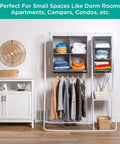 Two In One Hanging Closet Organizer With Built In Garment Rod And Four Spacious Shelves For Clothes Sweaters And Shoes Heavy Duty 600D Fabric Doubles Your Closet Capacity Reinforced Grey in a room with clothes and accessories.