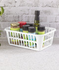 White Plastic Storage Baskets Set Of 48 for grab and go organization holding spices on a kitchen countertop