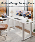 Sweeping L Shaped Standing Desk With Sturdy Four Leg Frame For Epic Gaming Or Pro Workstations, seen with monitors in modern office.