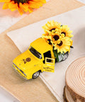 Farmhouse Sunflower Truck Decor Set Of Two That Is Perfect For Tiered Trays Mantel Or Shelf Displays Yellow Metal Diecast Pickup With Mini Sunflower Bouquet For Vintage Charm on burlap and wood.