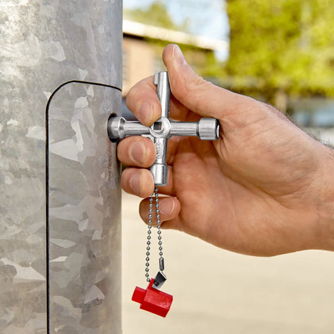 Heavy-Duty Long Reach Control Cabinet Keys For Gas Water And Electrical Shutoffs 3 Inch Tool in use on metal panel
