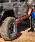 High Lift Recovery Jack 33 Inch 3.5 Ton Heavy Duty Off Road Farm Lifting Equipment lifting SUV on trail with wide base