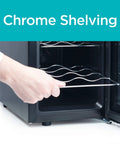 Hand pulling chrome rack from Compact 8 Bottle Capacity Wine Fridge With LED Display And Interior Light