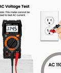 Digital Multimeter With Carrying Case For Home And Auto Use Tests DC And AC Voltage, showing AC voltage test on outlet.