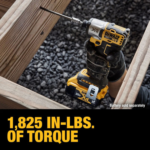 Worker using 20V Max XR Brushless Impact Driver With One Quarter Inch Hex High Torque 3 Speed LED Work Light Extended Runtime Cordless Tool Only 1825 In Lbs Torque And 3400 RPM on wood framing