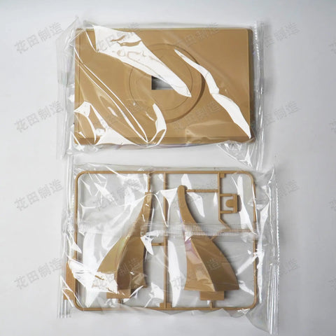 Plastic parts from Dune Harkonnen Ornithopter Model Kit 1/72 Scale With Stand in packaging, ready for assembly.