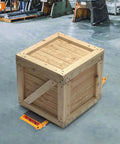 Heavy Duty Machine Skates With 33069 Lbs Capacity, Industrial Dolly Skate For Moving Equipment supporting a wooden crate.
