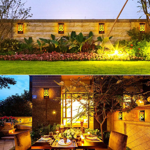 Realistic Solar Flame Lights Outdoor With 3D Flickering Flames That Look Legit Using 66 Ultra Bright LEDs IP65 Waterproof Wall Mount Lanterns Perfect For Your Deck Fence Patio Garden Auto On Off In Value Four Pack Set illuminating a garden wall and patio area