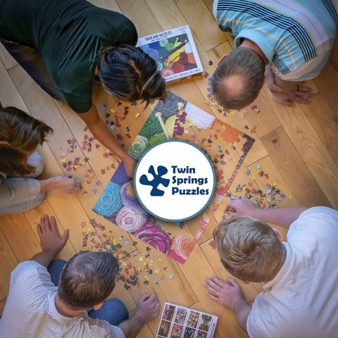 Group assembling Hot Air Balloon Festival 1000 Piece Jigsaw Puzzle With Easy Grip Pieces For Big Fun Building Sessions And A Sweet Way