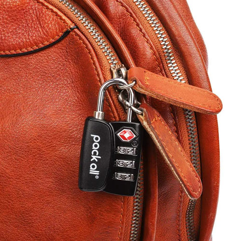4 Pack TSA Approved Luggage Locks With 3 Digit Combination on leather bag zipper, black alloy, red indicator visible.