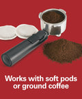 15 Bar Espresso Machine For Sippin Straight Up Lattes And Creamy Cappuccinos With Dual Auto Frother Brews Two Cups At Once Compatible With Pods Or Grounds 50 Oz Tank Black with a portafilter and coffee grounds.