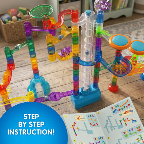 Glow In The Dark Marble Run Kit With 152 Pieces Featuring Motorized Spiral Lift Double Tracks Two Stunt Trampolines setup on floor