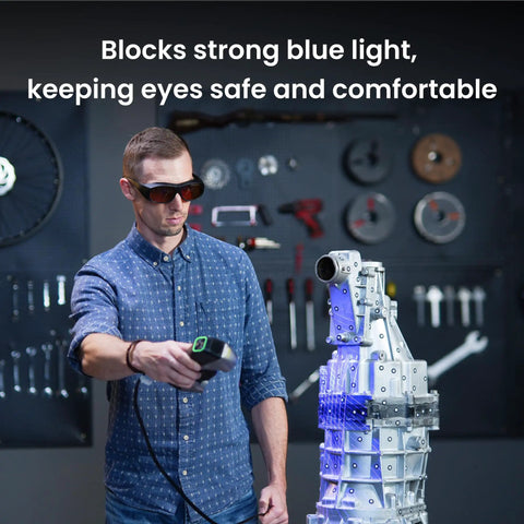 Heavy Duty OD5 Blue Laser Filter Safety Glasses For Precision 3D Scanning With Sick Eye Protection And Crystal Clear Ultraviolet Shielding For Hobbyists worn by a man during 3D scanning.