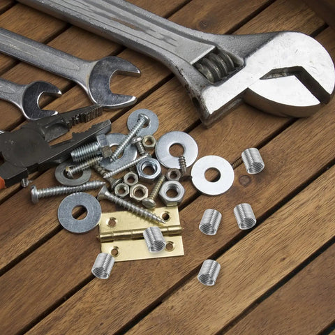 Pro Grade M8 Stainless Steel Thread Insert Kit With 10 Pieces alongside tools on wooden surface