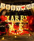 Marry Me Light Up Letters Proposal Kit With 7 Letter Signs 24 LED Tea Lights 2000 Burgundy Rose Petals And 30 Burgundy Balloons